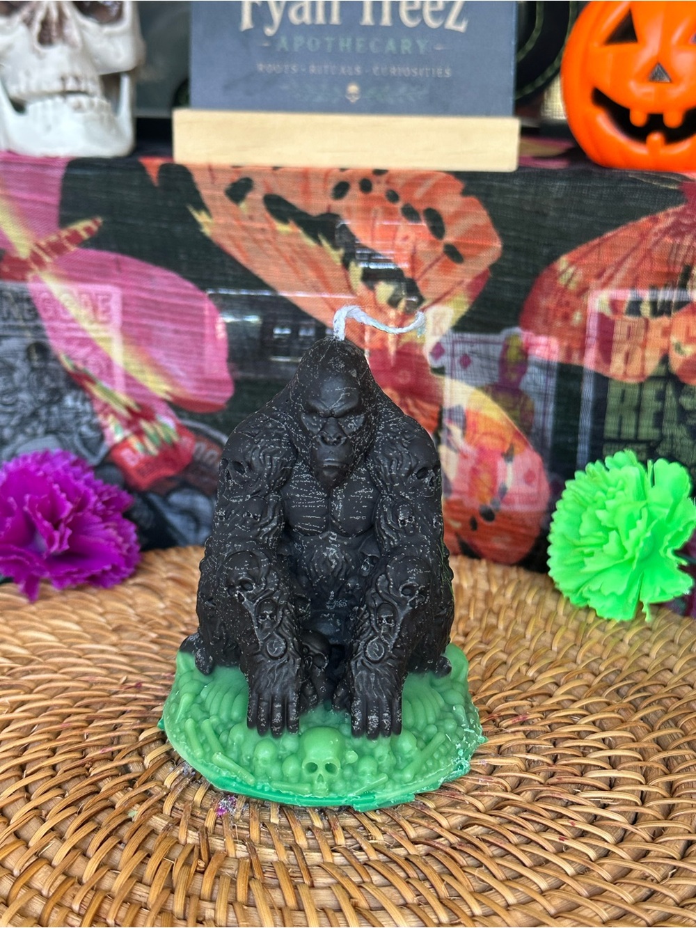 Handmade Black Gorilla Skull Candle with Bright Green Bone Base
